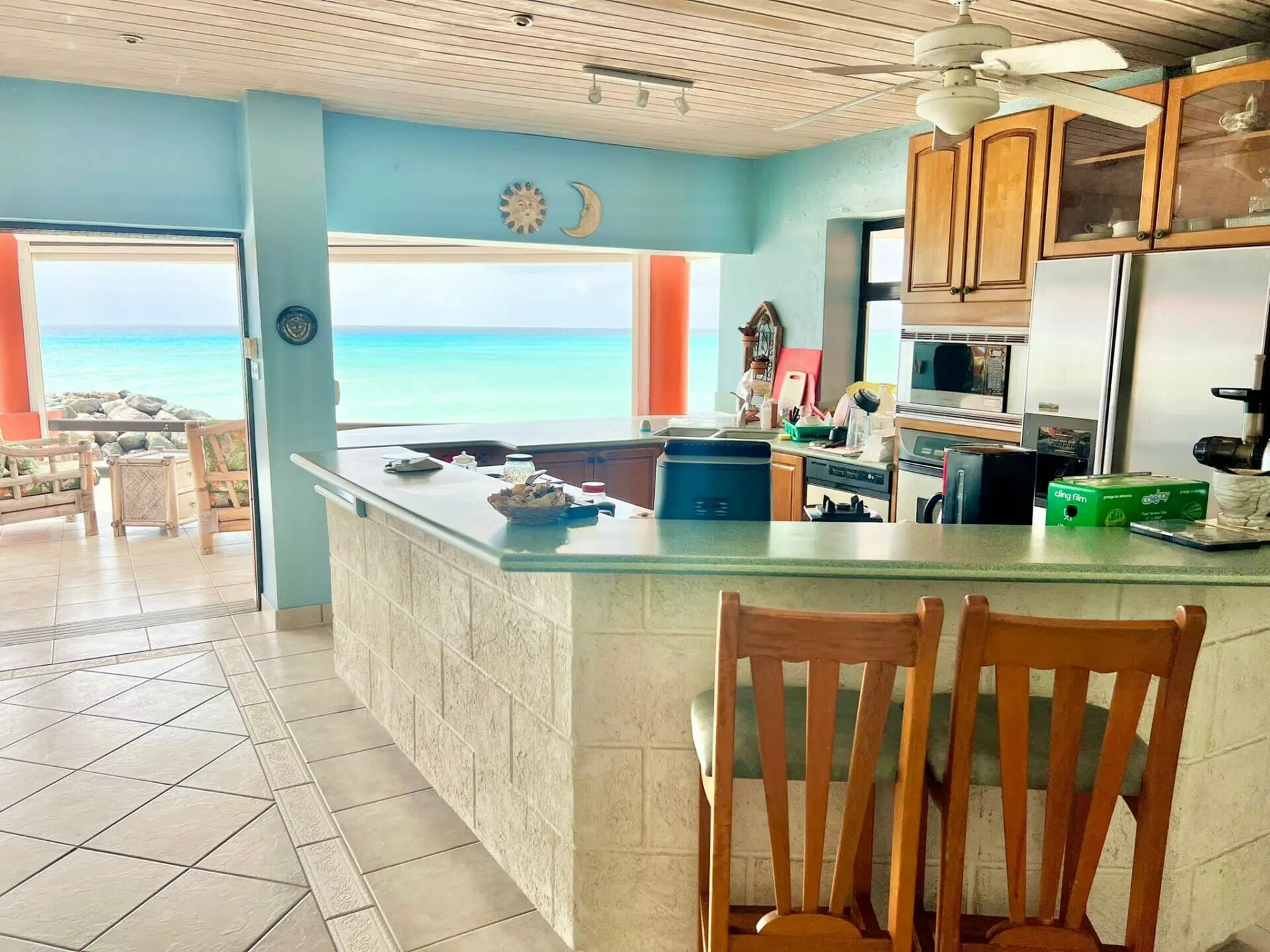 Kitchen with breakfast bar and ocean view